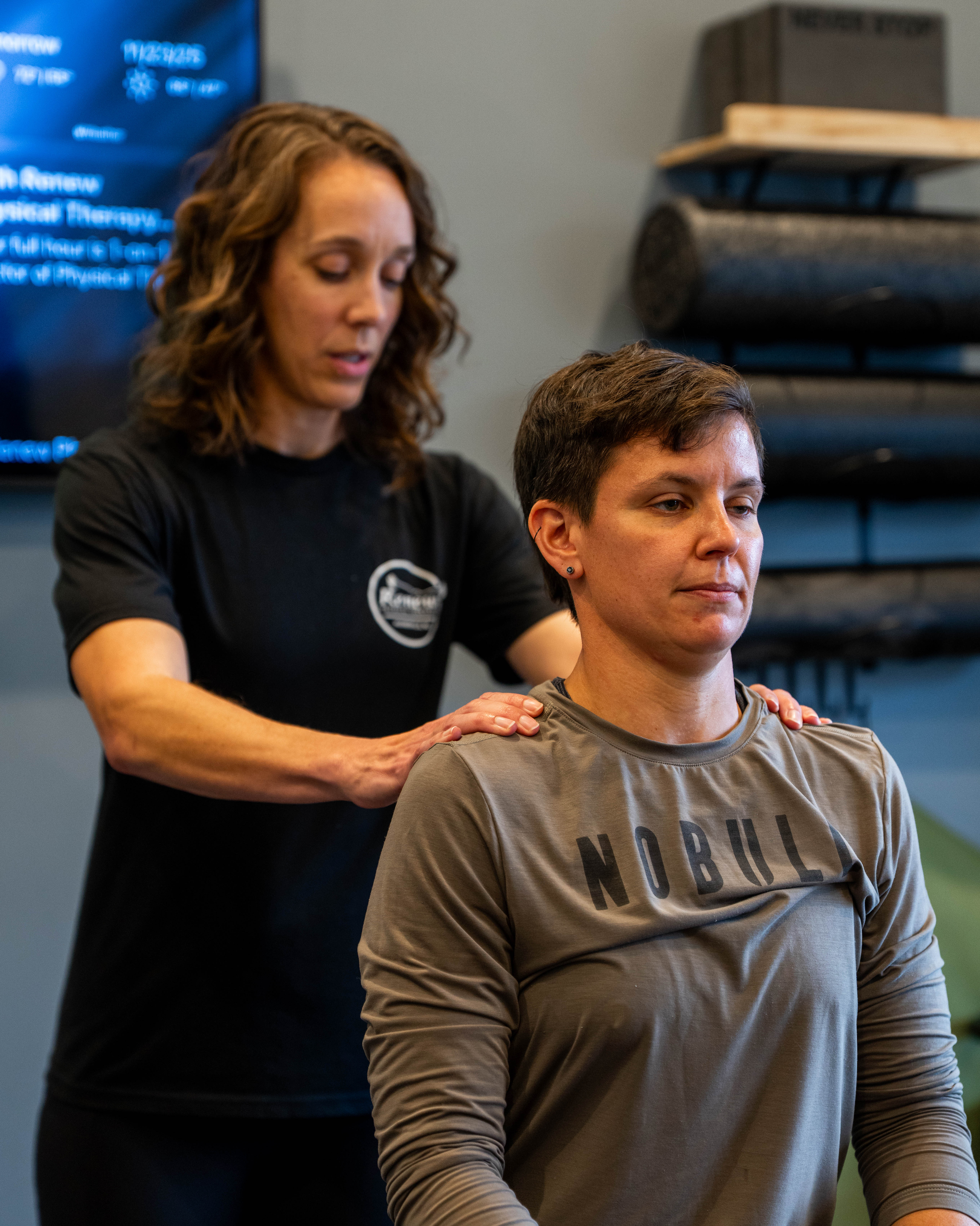 Patient working with a provider at a performance physical therapy clinic in Mooresville